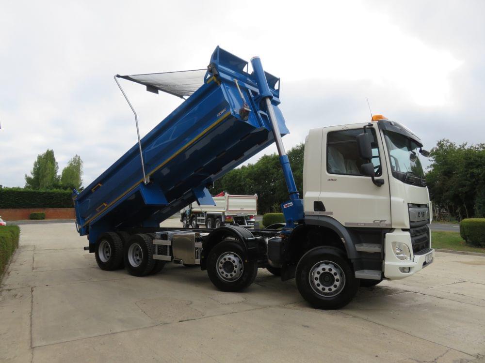 Black Tipper lorry with back up